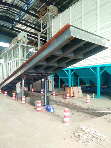 自動(dòng)液壓翻板卸車機(jī)