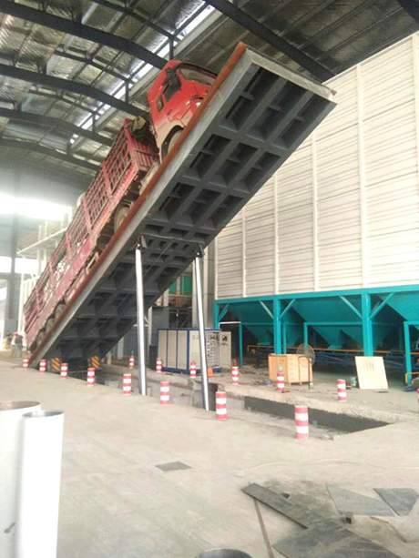 液壓翻板卸車機(jī)